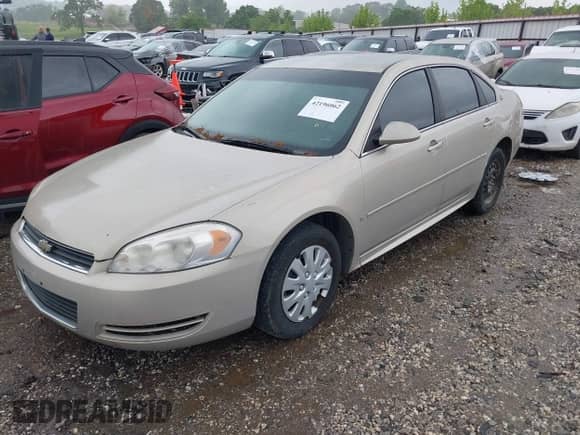 2009 Chevrolet Impala Police Police z VIN 2G1WS57MX91285861, wystawiony jako IAAI lot #42196062 z przebiegiem 242 677 mil mil oraz . Historia ofert i sprzedaży dostępna na DreamBid. Obrazek 2.