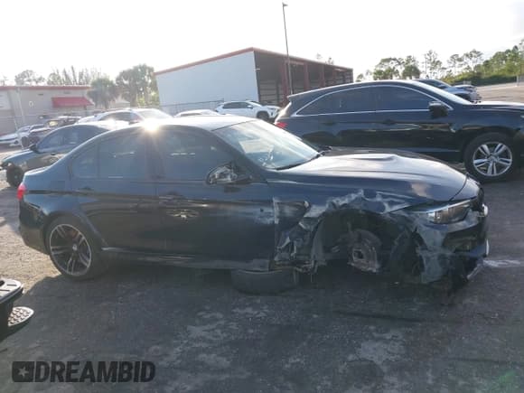 ✅ 2018 BMW M3 • VIN: WBS8M9C51J5L71667 • Lot: 43831833. Listed on IAAI with 53,105 mi. Free auction sales archive from the USA and detailed vehicle history report at DreamBid. Image 13.