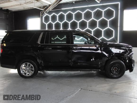✅ 2023 Chevrolet Suburban Premier • VIN: 1GNSCFKD6PR452020 • Lot: 90104625. Wystawiony na Copart z przebiegiem 39 600 mil. Bezpłatny archiwum sprzedaży aukcyjnych z USA i szczegółowy raport historii pojazdu na DreamBid. Zdjęcie 4.