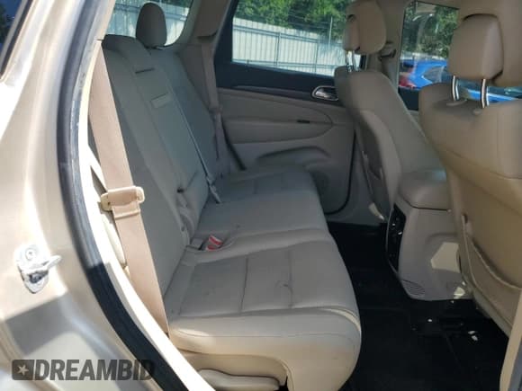 ✅ 2014 Jeep Grand Cherokee Laredo • VIN: 1C4RJEAG8EC243283 • Лот: 68132675. Опубликован ранее на Copart с пробегом 130 652 миль. Бесплатный доступ к архиву аукционных продаж из США и подробный отчёт об истории автомобиля на DreamBid. Изображение 11.