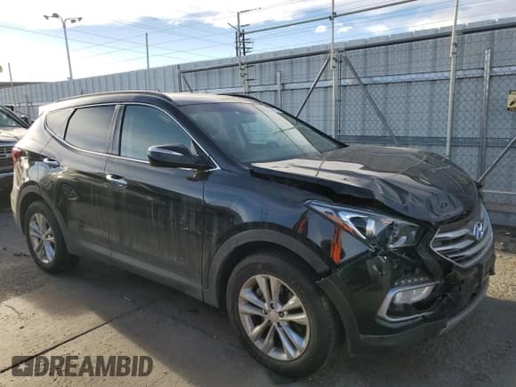 ✅ 2018 Hyundai Santa Fe 2.0T • VIN: 5NMZUDLA6JH106106 • Лот: 71894072. Опубликован ранее на Copart с пробегом 54 296 миль. Бесплатный доступ к архиву аукционных продаж из США и подробный отчёт об истории автомобиля на DreamBid. Изображение 4.