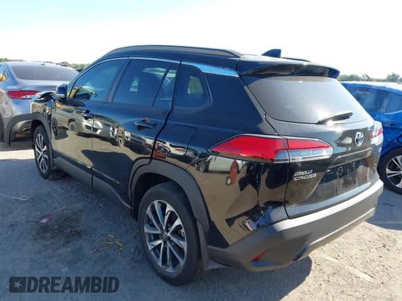 ✅ 2022 Toyota Corolla Cross XLE • VIN: 7MUDAABG4NV035441 • Лот: 43136388. Опубликован ранее на IAAI с пробегом 86 470 миль. Бесплатный доступ к архиву аукционных продаж из США и подробный отчёт об истории автомобиля на DreamBid. Изображение 3.