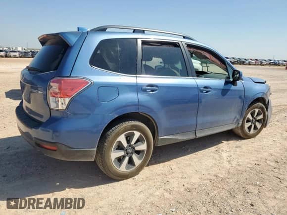 2017 Subaru Forester Limited with VIN JF2SJAJCXHH515686, listed as a Copart auction lot 67327815 with 104,049 mi miles and Salvage title. Bid and sale history available at DreamBid. Image 3.