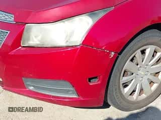 2011 Chevrolet Cruze 1LT z VIN 1G1PF5S97B7149238, wystawiony jako IAAI lot #43423542 z przebiegiem 170 444 mil mil oraz . Historia ofert i sprzedaży dostępna na DreamBid. Obrazek 6.