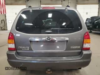 ✅ 2003 Mazda Tribute LX • VIN: 4F2YZ04173KM05549 • Lot: 86702895. Wystawiony na Copart z przebiegiem 128 757 mil. Bezpłatny archiwum sprzedaży aukcyjnych z USA i szczegółowy raport historii pojazdu na DreamBid. Zdjęcie 6.