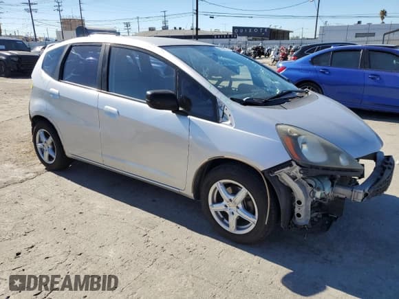 ✅ 2011 Honda Fit • VIN: JHMGE8H32BC028671 • Lot: 86864365. Listed on Copart with 144,992 mi. Free auction sales archive from the USA and detailed vehicle history report at DreamBid. Image 4.
