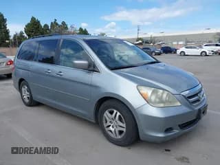 ✅ 2007 Honda Odyssey EX-L • VIN: 5FNRL38727B017587 • Lot: 41900739. Listed on IAAI with 216,909 mi. Free auction sales archive from the USA and detailed vehicle history report at DreamBid. Image 1.