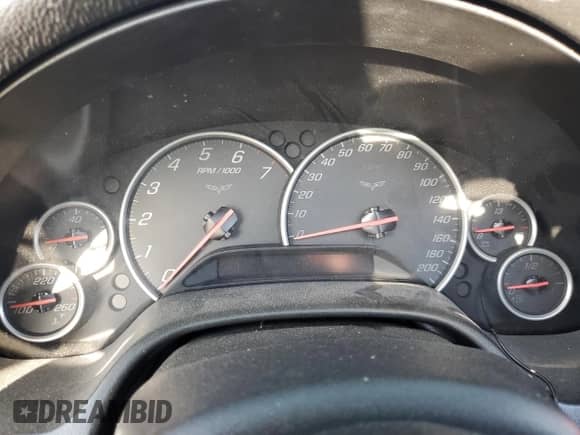 2005 Chevrolet Corvette с VIN 1G1YY24U655127956, выставлен на аукционе Copart как лот 72440104 с пробегом Не указан миль и Списание • Salvage title. История ставок и продаж доступна на DreamBid. Изображение 9.