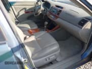 ✅ 2004 Toyota Camry LE • VIN: 4T1BE30K94U893597 • Lot: 42987871. Wystawiony na IAAI z przebiegiem 143 430 mil. Bezpłatny archiwum sprzedaży aukcyjnych z USA i szczegółowy raport historii pojazdu na DreamBid. Zdjęcie 5.