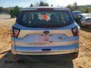 ✅ 2018 Ford Escape S • VIN: 1FMCU0F78JUB36579 • Lot: 85364795. Listed on Copart with 98,225 mi. Free auction sales archive from the USA and detailed vehicle history report at DreamBid. Image 6.