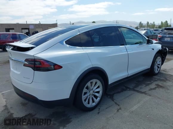 ✅ 2021 Tesla Model X Long Range Plus • VIN: 5YJXCDE27MF322200 • Lot: 42360282. Listed on IAAI with 37,072 mi. Free auction sales archive from the USA and detailed vehicle history report at DreamBid. Image 4.