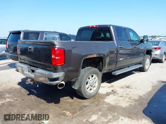 ✅ 2015 Chevrolet Silverado 2500HD LT • VIN: 1GC1KVE8XFF117049 • Lot: 42800240. Listed on IAAI with 375,598 mi. Free auction sales archive from the USA and detailed vehicle history report at DreamBid. Image 4.