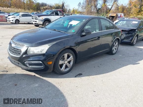 ✅ 2015 Chevrolet Cruze LT • VIN: 1G1PE5SB6F7200658 • Лот: 43658172. Опубликован ранее на IAAI с пробегом 141 275 миль. Бесплатный доступ к архиву аукционных продаж из США и подробный отчёт об истории автомобиля на DreamBid. Изображение 2.