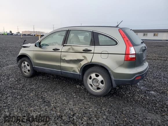 ✅ 2007 Honda CR-V LX • VIN: JHLRE38377C058224 • Lot: 93041215. Wystawiony na Copart z przebiegiem 239 719 mil. Bezpłatny archiwum sprzedaży aukcyjnych z USA i szczegółowy raport historii pojazdu na DreamBid. Zdjęcie 2.