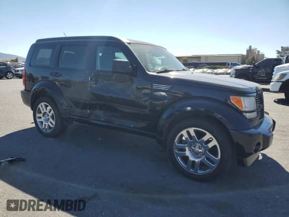 2007 Dodge Nitro R/T z VIN 1D8GT58677W627976, wystawiony jako Copart lot #70620994 z przebiegiem 146 750 mil mil oraz Szkoda całkowita • Salvage title. Historia ofert i sprzedaży dostępna na DreamBid. Obrazek 4.