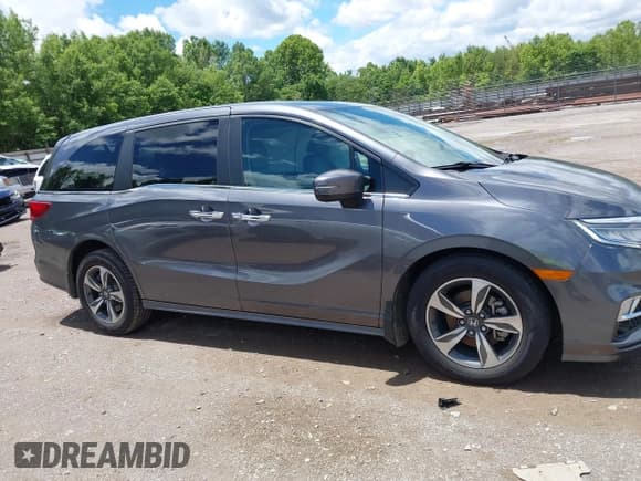 ✅ 2020 Honda Odyssey Touring • VIN: 5FNRL6H88LB006307 • Lot: 42332172. Listed on IAAI with 44,659 mi. Free auction sales archive from the USA and detailed vehicle history report at DreamBid. Image 13.