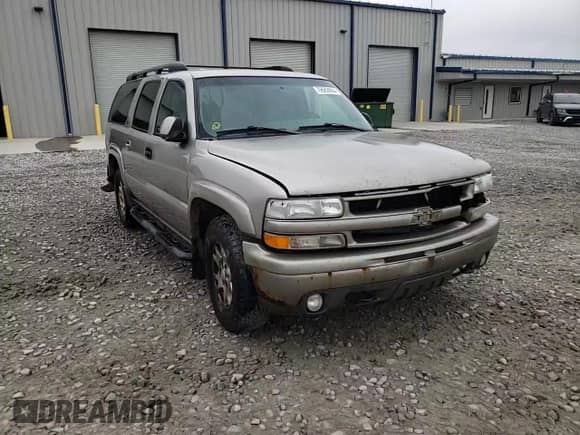 2003 Chevrolet Suburban Z71 z VIN 3GNFK16Z93G197080, wystawiony jako Copart lot #79689684 z przebiegiem 254 809 mil mil oraz Szkoda całkowita • Salvage title. Historia ofert i sprzedaży dostępna na DreamBid. Obrazek 12.