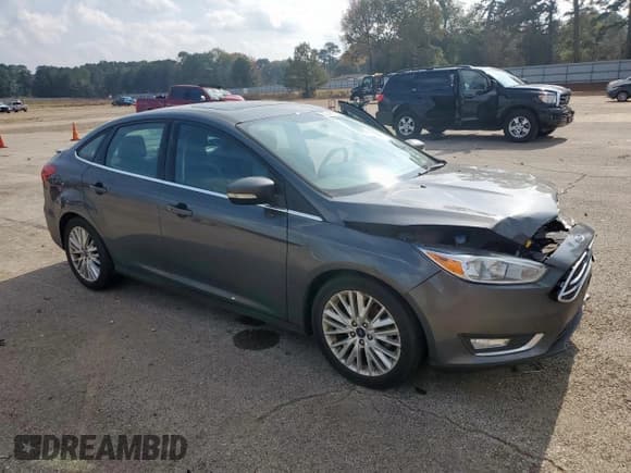 ✅ 2018 Ford Focus Titanium • VIN: 1FADP3J24JL277660 • Лот: 93348165. Опубликован ранее на Copart с пробегом 74 235 миль. Бесплатный доступ к архиву аукционных продаж из США и подробный отчёт об истории автомобиля на DreamBid. Изображение 4.