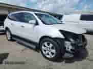 2016 Chevrolet Traverse LT with VIN 1GNKRGKD4GJ240851, listed as a Copart auction lot 62824275 with 99,928 mi miles and Salvage title. Bid and sale history available at DreamBid. Image 4.