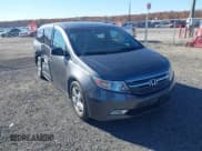 ✅ 2012 Honda Odyssey Touring • VIN: 5FNRL5H96CB103962 • Lot: 43587214. Listed on IAAI with 169,916 mi. Free auction sales archive from the USA and detailed vehicle history report at DreamBid. Image 1.