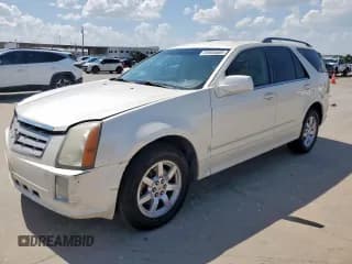 ✅ 2009 Cadillac SRX RWD • VIN: 1GYEE637690104602 • Lot: 64604685. Listed on Copart with 153,455 mi. Free auction sales archive from the USA and detailed vehicle history report at DreamBid. Image 1.