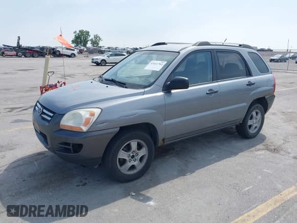 ✅ 2006 Kia Sportage LX • VIN: KNDJF724867286014 • Лот: 42411762. Опубликован ранее на IAAI с пробегом 260 946 миль. Бесплатный доступ к архиву аукционных продаж из США и подробный отчёт об истории автомобиля на DreamBid. Изображение 2.