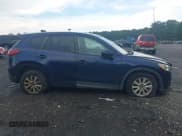 ✅ 2013 Mazda CX-5 Touring • VIN: JM3KE2CE1D0132257 • Lot: 42700625. Listed on IAAI with 87,796 mi. Free auction sales archive from the USA and detailed vehicle history report at DreamBid. Image 13.