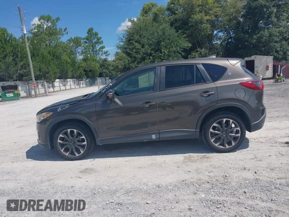 ✅ 2016 Mazda CX-5 Grand Touring • VIN: JM3KE2DY7G0782899 • Lot: 42949510. Wystawiony na IAAI z przebiegiem 85 502 mil. Bezpłatny archiwum sprzedaży aukcyjnych z USA i szczegółowy raport historii pojazdu na DreamBid. Zdjęcie 14.