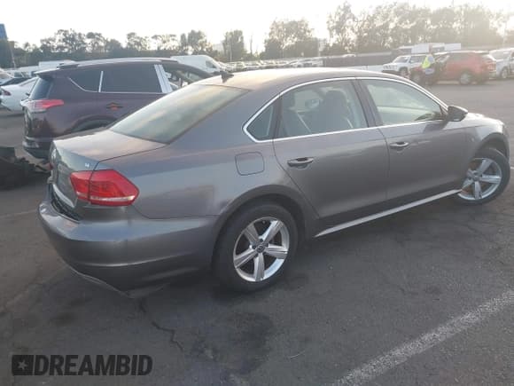 ✅ 2012 Volkswagen Passat SE • VIN: 1VWBP7A35CC071605 • Lot: 43650796. Listed on IAAI with 215,229 mi. Free auction sales archive from the USA and detailed vehicle history report at DreamBid. Image 4.