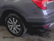 ✅ 2022 Honda Pilot EX-L • VIN: 5FNYF6H57NB019660 • Lot: 42611787. Listed on IAAI with 80,868 mi. Free auction sales archive from the USA and detailed vehicle history report at DreamBid. Image 1.