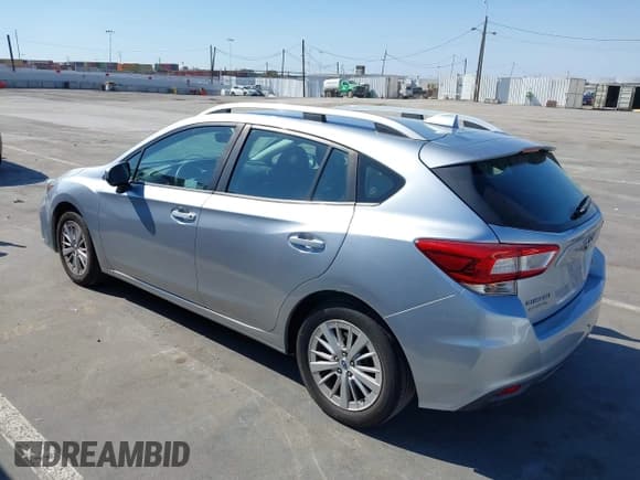 ✅ 2018 Subaru Impreza Premium • VIN: 4S3GTAD62J3752616 • Lot: 43120942. Listed on IAAI with 99,641 mi. Free auction sales archive from the USA and detailed vehicle history report at DreamBid. Image 3.