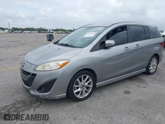 ✅ 2013 Mazda 5 Touring • VIN: JM1CW2CL5D0160104 • Lot: 41722470. Listed on IAAI with 135,708 mi. Free auction sales archive from the USA and detailed vehicle history report at DreamBid. Image 2.