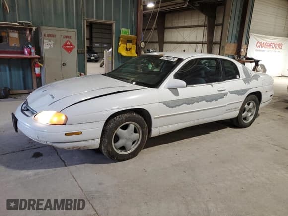 ✅ 1999 Chevrolet Monte Carlo LS • VIN: 2G1WW12M4X9298849 • Lot: 57808255. Listed on Copart with 125,443 mi. Free auction sales archive from the USA and detailed vehicle history report at DreamBid. Image 1.