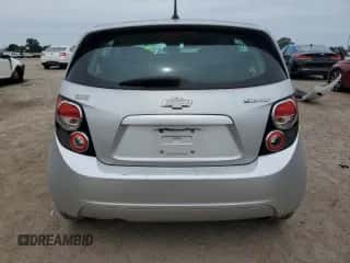 2012 Chevrolet Sonic LS с VIN 1G1JB6SH8C4111471, выставлен на аукционе Copart как лот 69838304 с пробегом Не указан миль и Списание • Salvage title. История ставок и продаж доступна на DreamBid. Изображение 6.