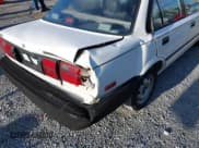 ✅ 1991 Toyota Corolla • VIN: JT2AE94A6M3472035 • Lot: 42631743. Listed on IAAI with 181,887 mi. Free auction sales archive from the USA and detailed vehicle history report at DreamBid. Image 19.