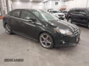✅ 2014 Ford Focus Titanium • VIN: 1FADP3J29EL315924 • Lot: 43728139. Listed on IAAI with 78,540 mi. Free auction sales archive from the USA and detailed vehicle history report at DreamBid. Image 1.
