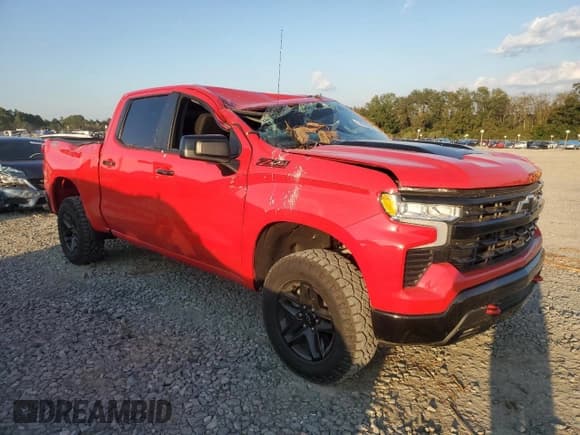 ✅ 2022 Chevrolet Silverado 1500 LT Trail Boss • VIN: 3GCUDFED0NG658781 • Lot: 74665864. Wystawiony na Copart z przebiegiem 13 963 mil. Bezpłatny archiwum sprzedaży aukcyjnych z USA i szczegółowy raport historii pojazdu na DreamBid. Zdjęcie 4.