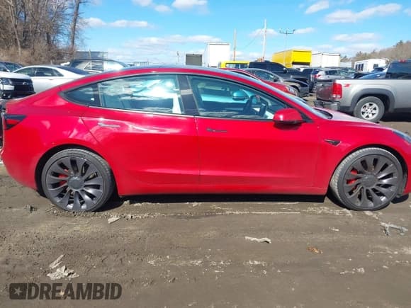 ✅ 2021 Tesla Model 3 Performance • VIN: 5YJ3E1EC5MF061178 • Lot: 41600498. Listed on IAAI with 30,761 mi. Free auction sales archive from the USA and detailed vehicle history report at DreamBid. Image 13.