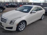 ✅ 2014 Cadillac ATS Standard AWD • VIN: 1G6AG5RX5E0104443 • Lot: 43887962. Listed on IAAI with 116,663 mi. Free auction sales archive from the USA and detailed vehicle history report at DreamBid. Image 2.