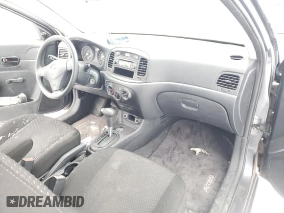 ✅ 2007 Hyundai Accent GS • VIN: KMHCN35C77U014219 • Лот: 83682474. Опубликован ранее на Copart с пробегом 264 978 миль. Бесплатный доступ к архиву аукционных продаж из США и подробный отчёт об истории автомобиля на DreamBid. Изображение 8.