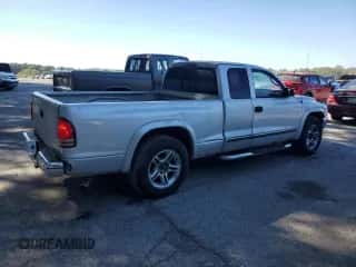 2004 Dodge Dakota SLT z VIN 1D7GL42N54S750919, wystawiony jako Copart lot #74625574 z przebiegiem 174 107 mil mil oraz Czysty tytuł • Clean title. Historia ofert i sprzedaży dostępna na DreamBid. Obrazek 3.