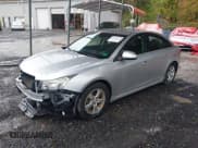 ✅ 2016 Chevrolet Cruze LT • VIN: 1G1PE5SB7G7199053 • Lot: 43536210. Listed on IAAI with 104,785 mi. Free auction sales archive from the USA and detailed vehicle history report at DreamBid. Image 2.