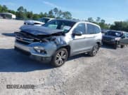 ✅ 2017 Honda Pilot EX-L • VIN: 5FNYF5H7XHB027767 • Lot: 42332282. Listed on IAAI with 50,611 mi. Free auction sales archive from the USA and detailed vehicle history report at DreamBid. Image 18.