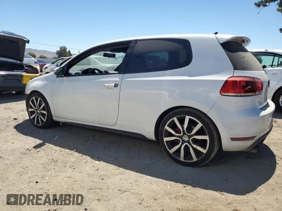 ✅ 2012 Volkswagen Golf GTI w/Conv & Sunroof • VIN: WVWEV7AJXCW009863 • Lot: 67143665. Listed on Copart with 123,549 mi. Free auction sales archive from the USA and detailed vehicle history report at DreamBid. Image 2.