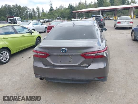 2022 Toyota Camry Hybrid XLE with VIN 4T1F31AK6NU575433, listed as a IAAI auction lot 42841689 with 65,526 mi miles and . Bid and sale history available at DreamBid. Image 16.