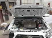 ✅ 2014 Toyota Tacoma • VIN: 3TMLU4EN5EM158285 • Lot: 42583384. Listed on IAAI with 11,353 mi. Free auction sales archive from the USA and detailed vehicle history report at DreamBid. Image 10.