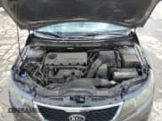 ✅ 2013 Kia Forte EX • VIN: KNAFU5A25D5670578 • Лот: 86531005. Опубликован ранее на Copart с пробегом 129 331 миль. Бесплатный доступ к архиву аукционных продаж из США и подробный отчёт об истории автомобиля на DreamBid. Изображение 12.