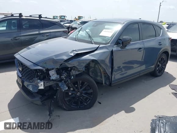 ✅ 2023 Mazda CX-5 S Carbon Edition • VIN: JM3KFBCMXP0136901 • Lot: 42630209. Listed on IAAI with 22,519 mi. Free auction sales archive from the USA and detailed vehicle history report at DreamBid. Image 16.