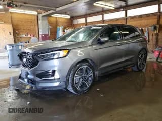 ✅ 2022 Ford Edge ST • VIN: 2FMPK4AP3NBA12477 • Lot: 54134595. Wystawiony na Copart z przebiegiem 125 526 mil. Bezpłatny archiwum sprzedaży aukcyjnych z USA i szczegółowy raport historii pojazdu na DreamBid. Zdjęcie 1.