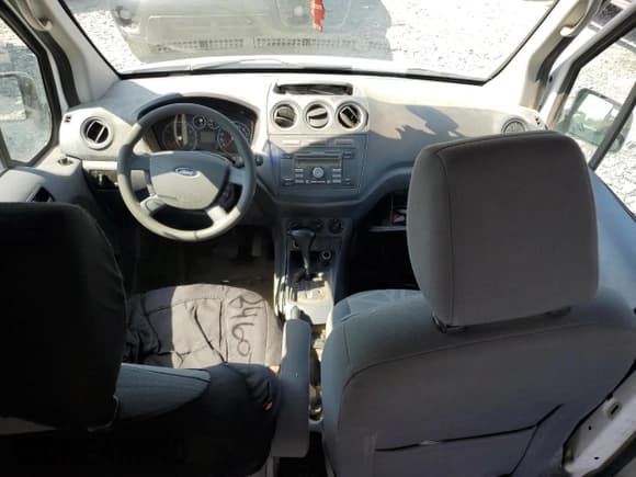 ✅ 2012 Ford Transit Connect XLT • VIN: NM0LS7DN7CT077499 • Lot: 67246035. Listed on Copart with 239,571 mi. Free auction sales archive from the USA and detailed vehicle history report at DreamBid. Image 8.